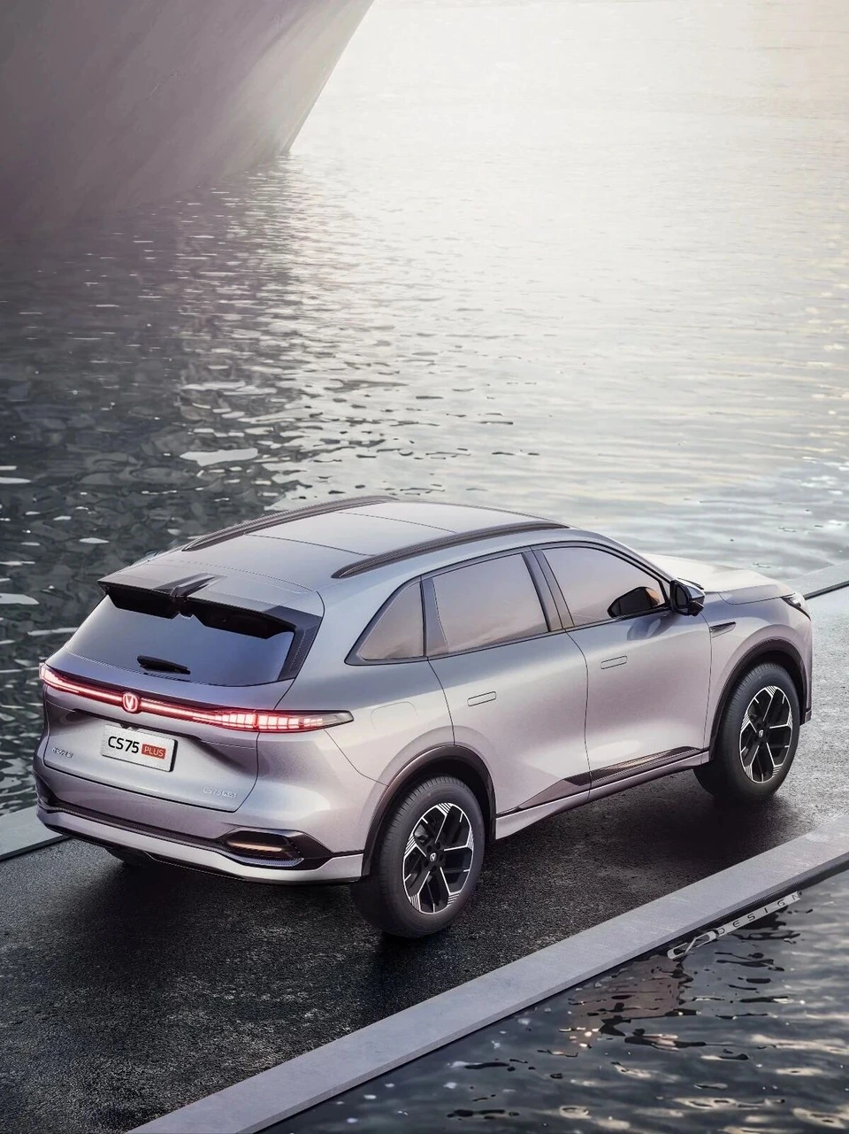 Changan CS75 Plus — elevated rear exterior beside water